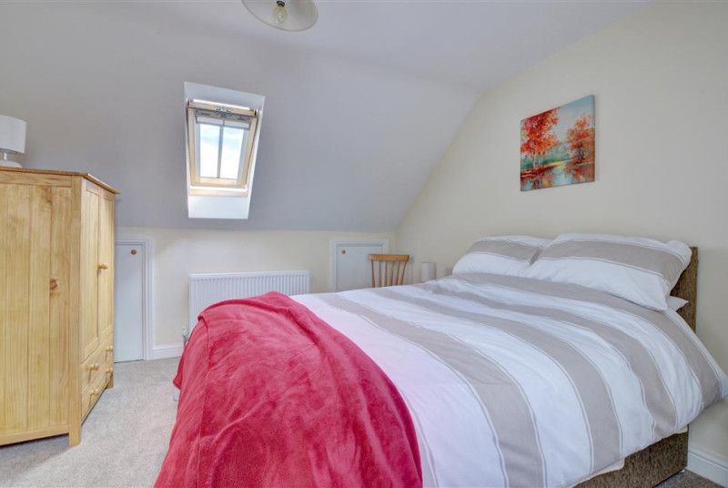 Bedroom 2 has a wardrobe.