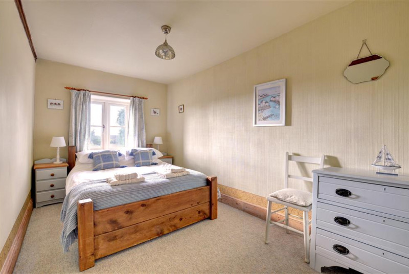 Spacious bedroom with double bed
