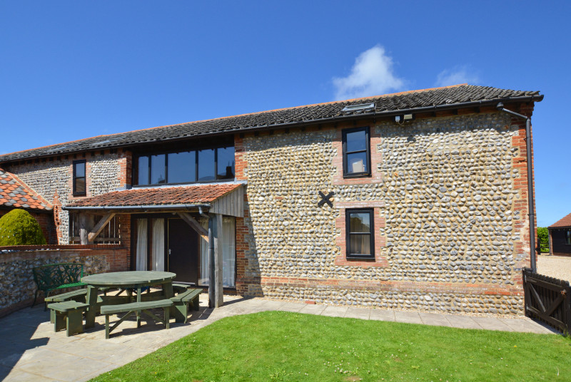 Exterior image of this handsome barn conversion