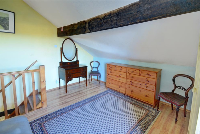 The spacious dressing area of the bedroom.