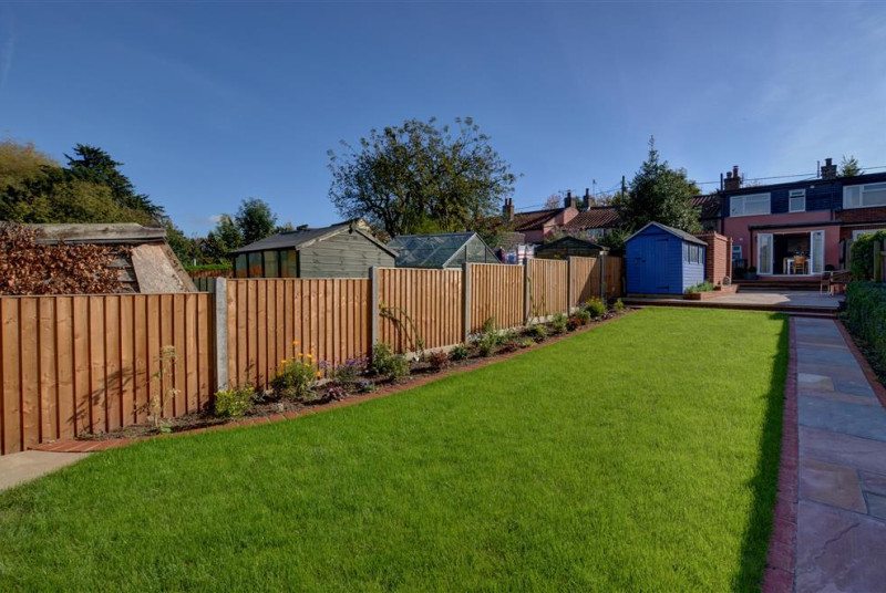 With paved areas and lawn areas this rear garden caters for all those who stay.