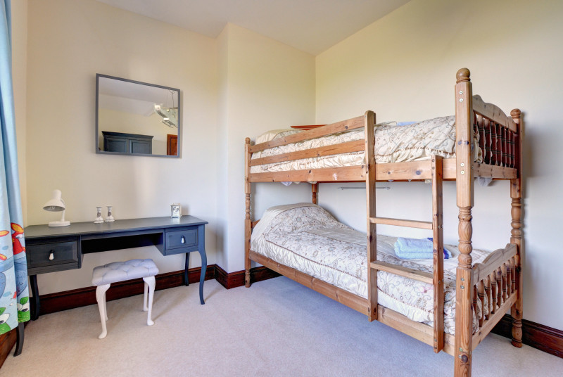 Bunk-beds in bedroom 3 which overlooks the sea