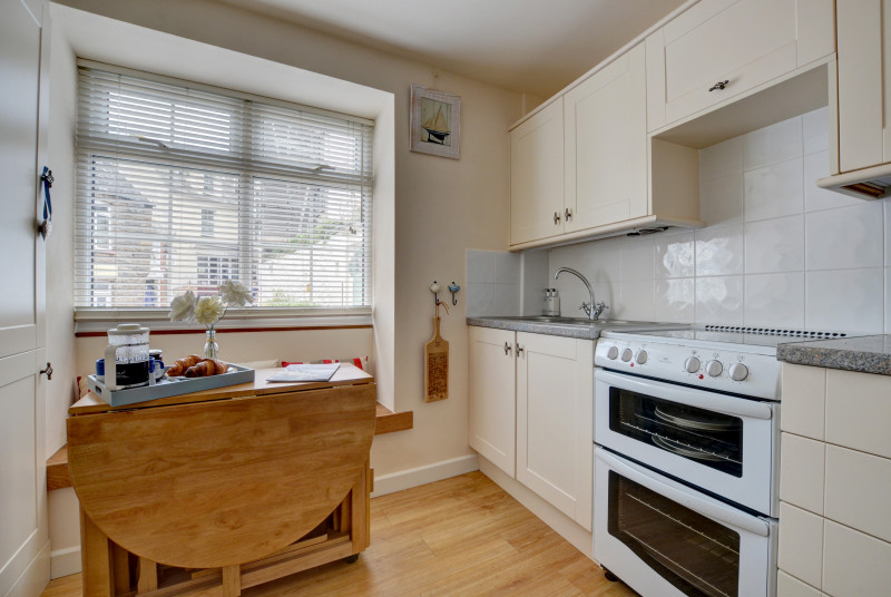 Compact kitchen with dining table