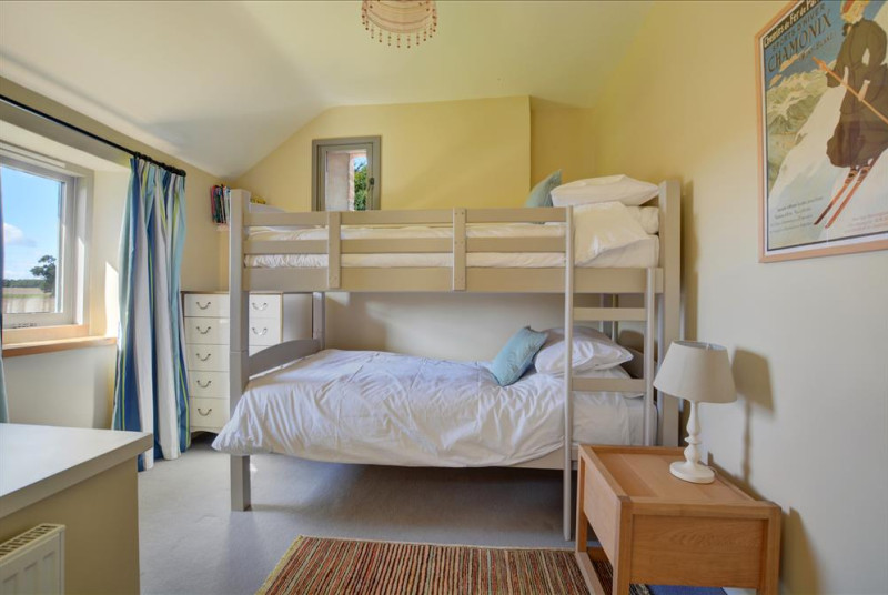 Bedroom five has full sized bunk beds