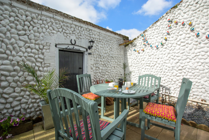 Courtyard with table and chairs