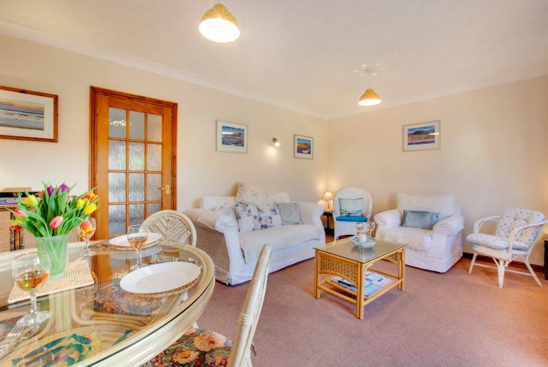 The sitting room is a large and welcoming space to enjoy your break