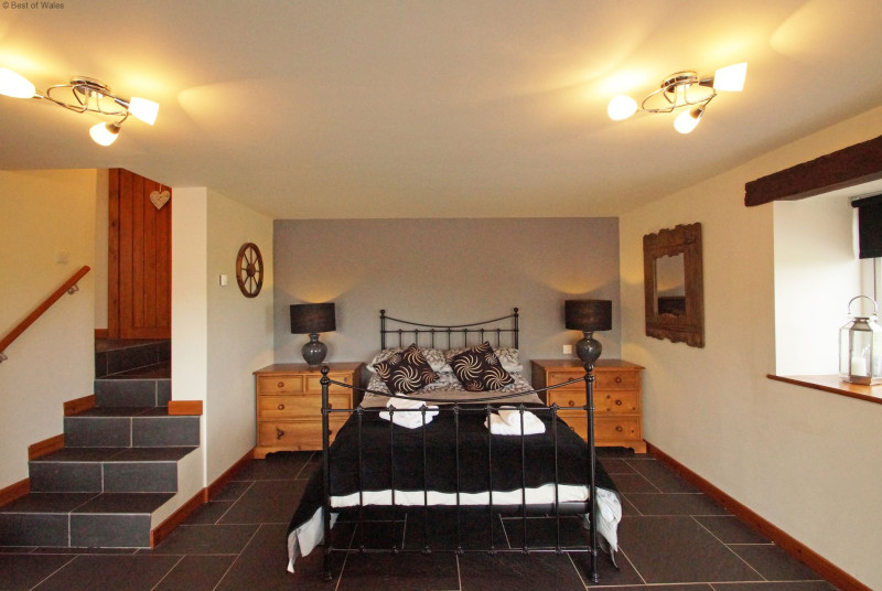 Bedroom 1 - Large downstairs double bedroom with patio area