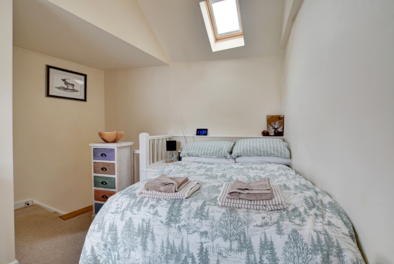 The double bedroom has an ensuite shower room