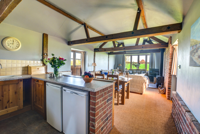 Light, airy, open plan area with character beams