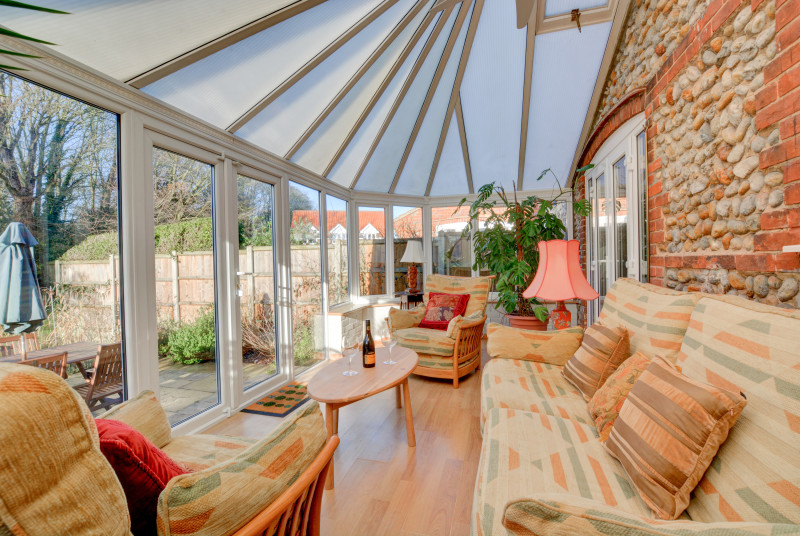 Conservatory with comfortable seating