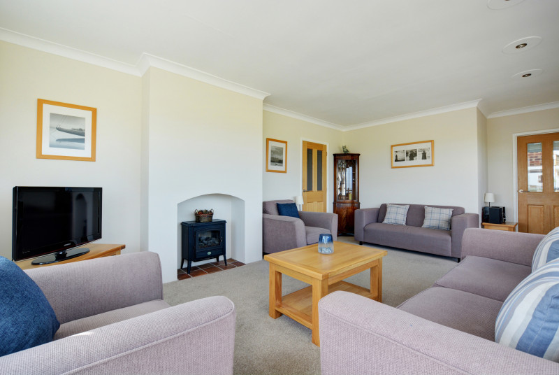 Contemporary style living space with tasteful furnishings, perfect family space