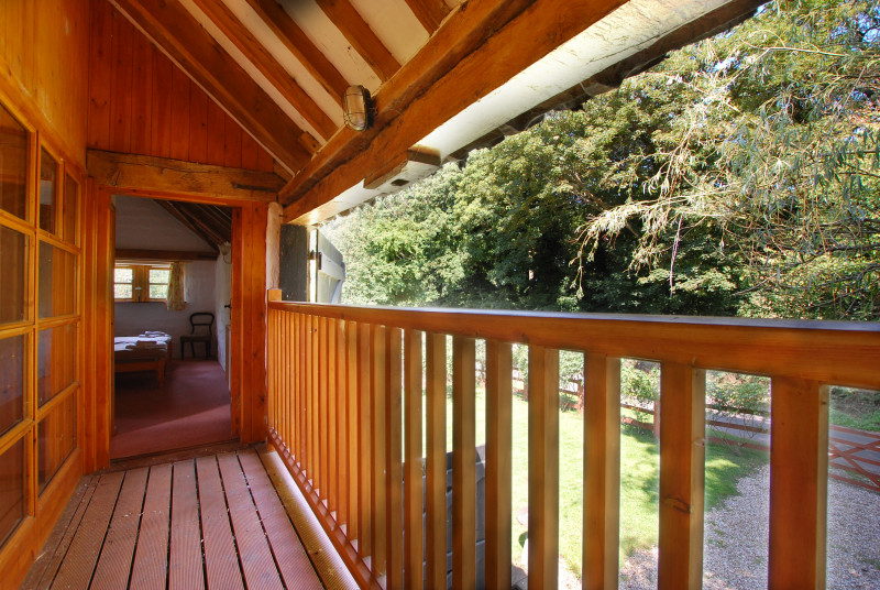 The balcony looks out to the front of the property 