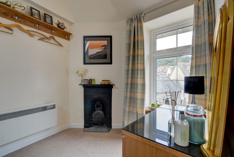 Dressing table and feature fireplace in the bedroom