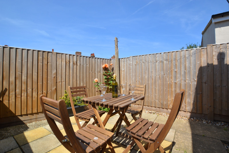Patio area with table and chairs