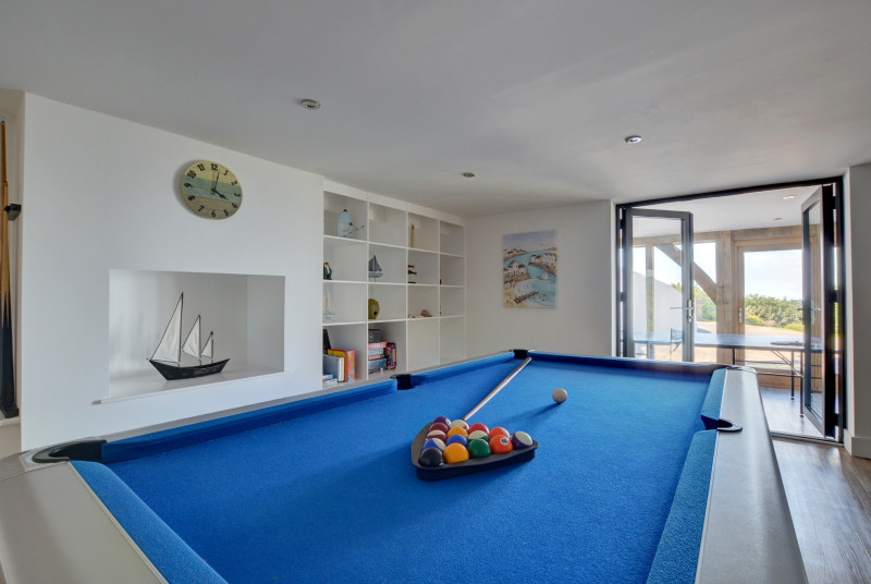 On the lower ground floor is a good size games room complete with pool table 