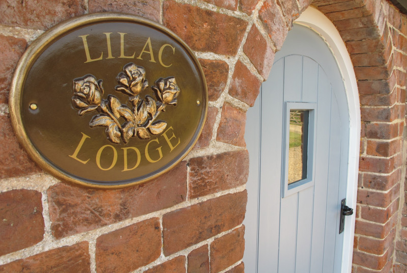 Courtyard garden with table, chairs and a barbecue, ideal for al fresco dining
