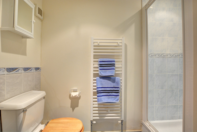Modern and bright shower room with cubicle