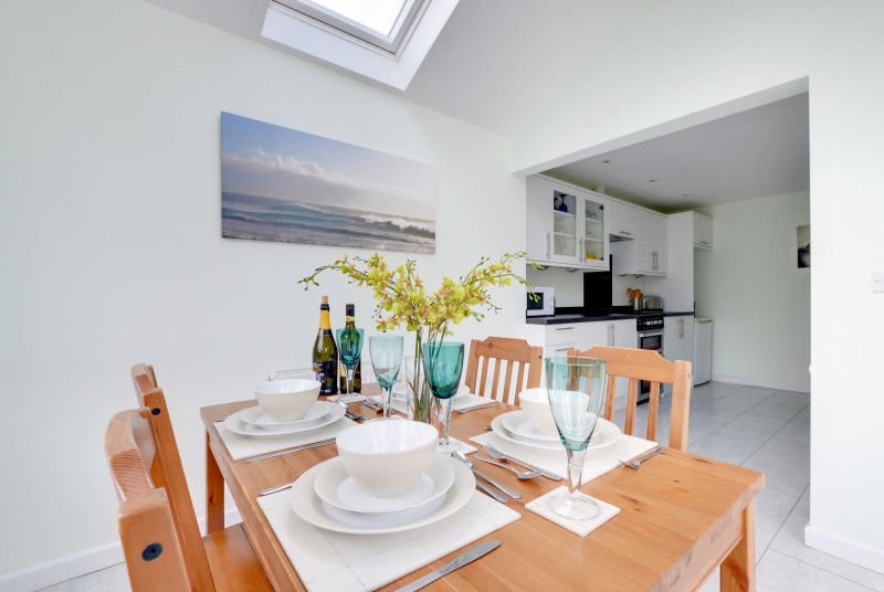 The velux window allows light to pour into the dining area