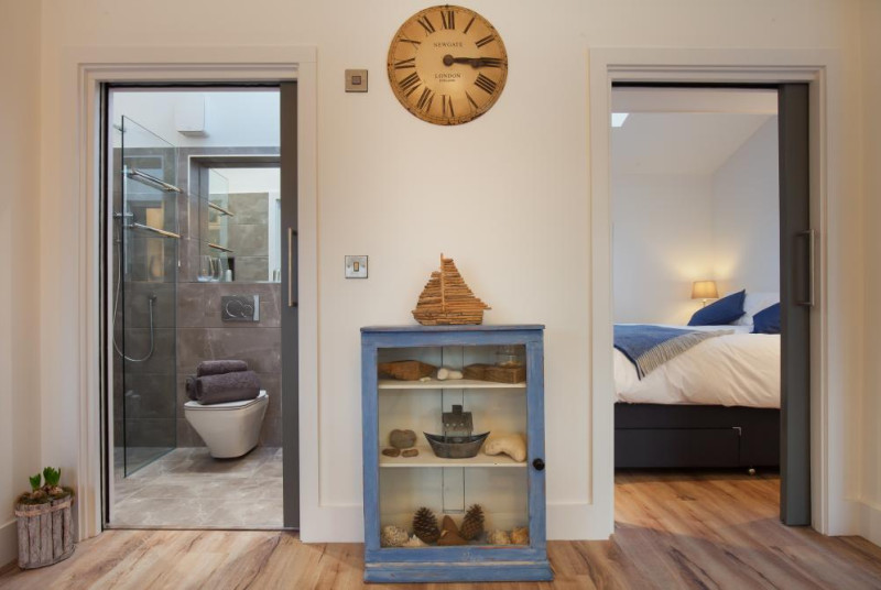 Hygge House, Shaldon - Bathroom and master bedroom view