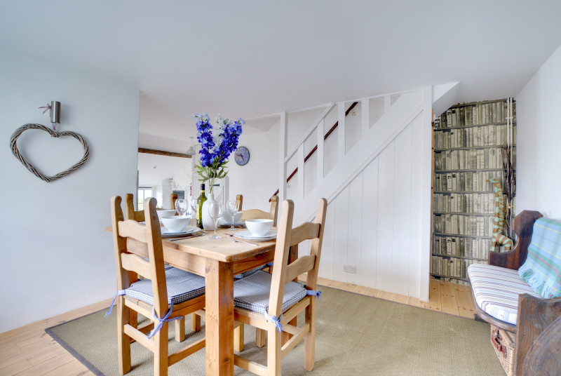Enjoy any meal around the dining room table, just off from the kitchen
