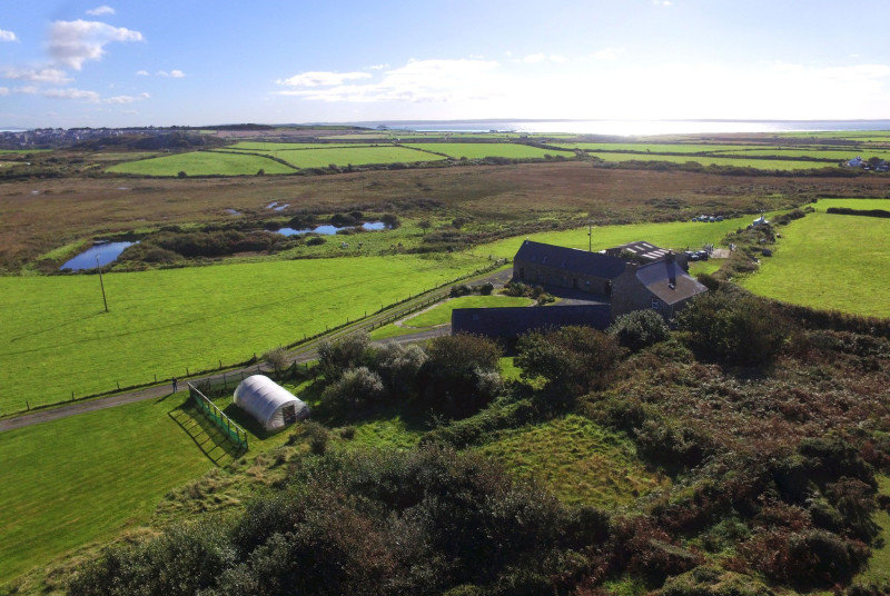 Aerial view looking East over the cottage