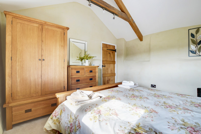 An attractive bedroom with Kingsize bed and shower room complete the internal accommodation