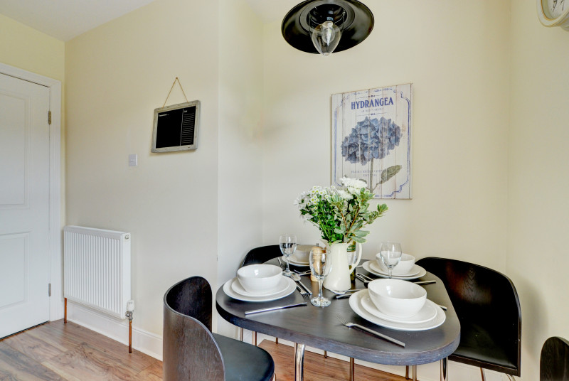 The compact dining table in the kitchen