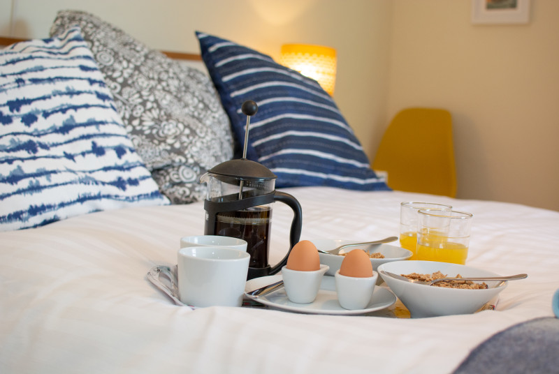 Larkrise breakfast tray on bed