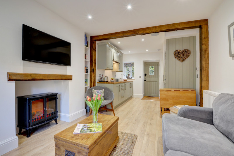Fox cottage has a modern contemporary style yet the original character of this 17th century cottage can still be seen in the beams and inglenook fireplace