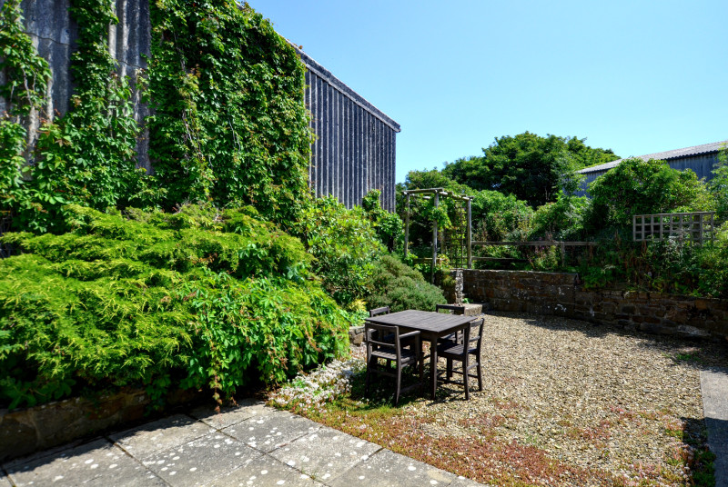 Garden furniture in the enclosed garden