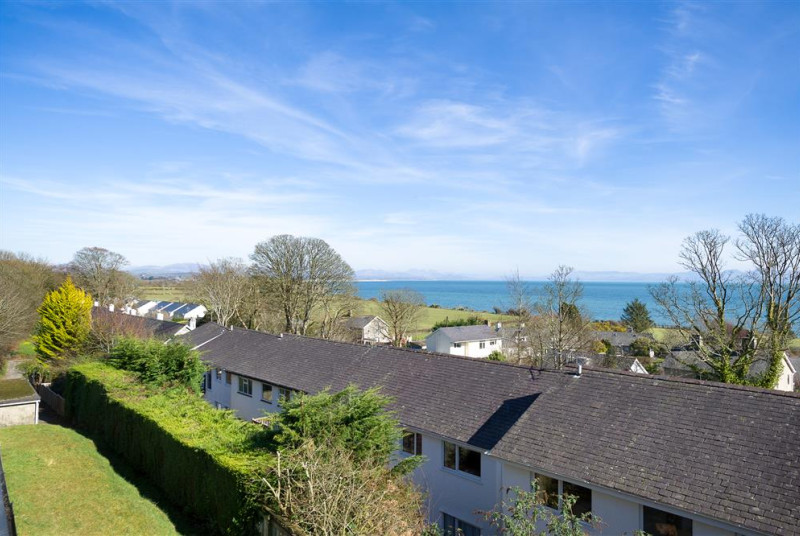 Sit back and enjoy the sea views over the rooftops of Abersoch