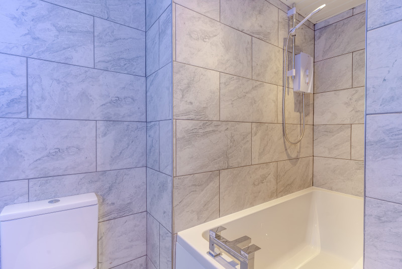  shower over bath at Hafan y Ddinas Cardiff Apartment 2