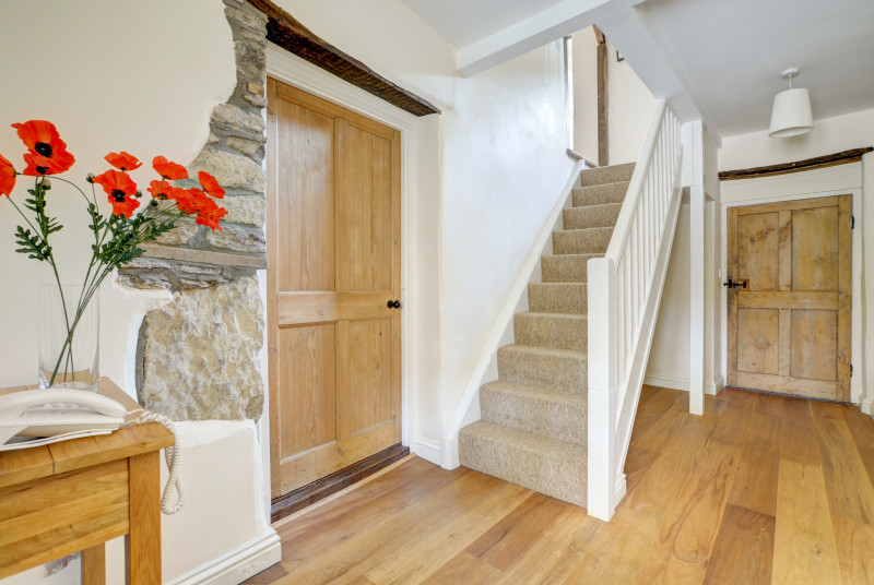 The hallway has exposed brickwork