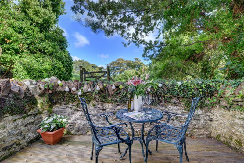 Picturesque patio with garden furniture