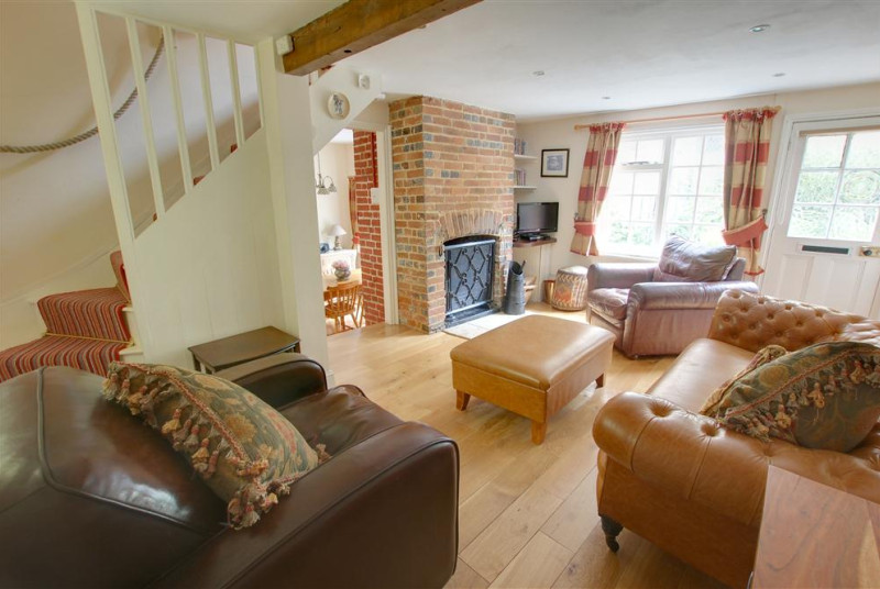 Warm, welcoming and child friendly cottage with very comfortable sitting room - with a real open fire