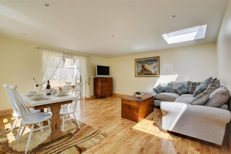 Spacious room with sitting and dining areas