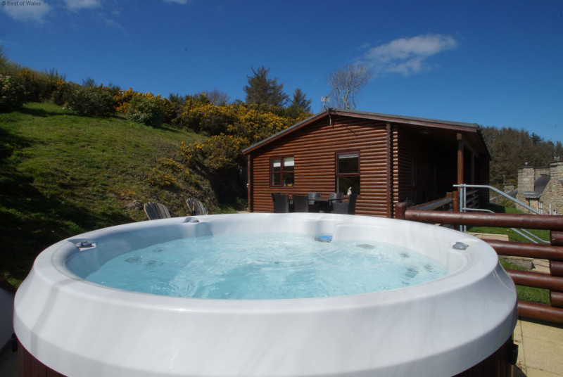 Relax for hours on the patio at Gorwel Log Cabin North Wales