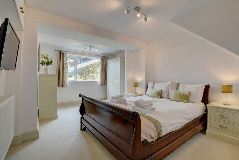 The downstairs double bedroom with bathroom adjacent 