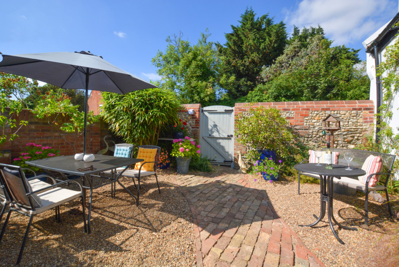 Courtyard garden with table and chairs