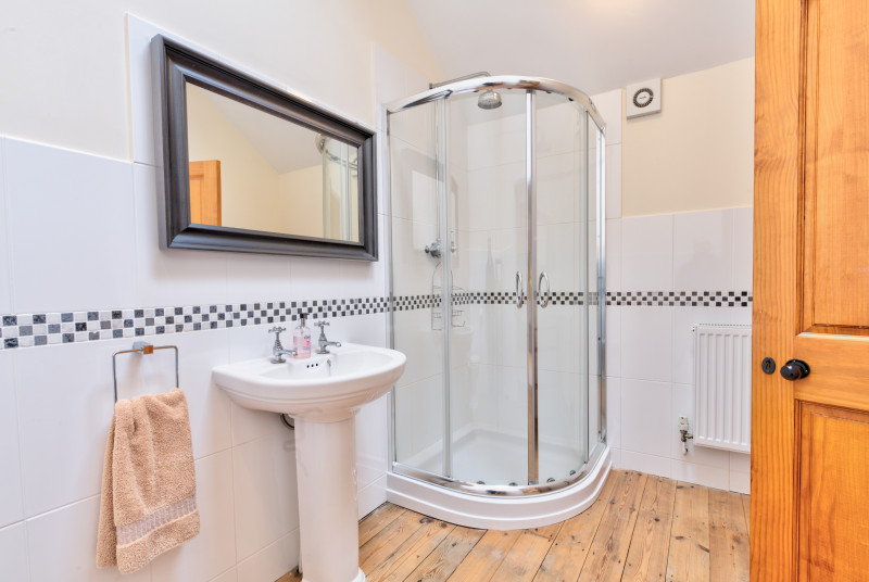 Master bedroom ensuite with corner shower