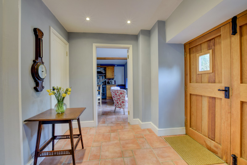Entrance hall with feature wooden entrance doors