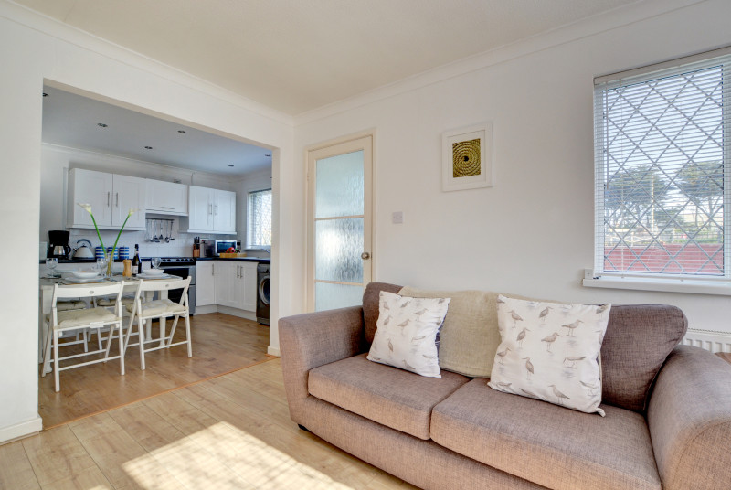Open plan sitting room and kitchen