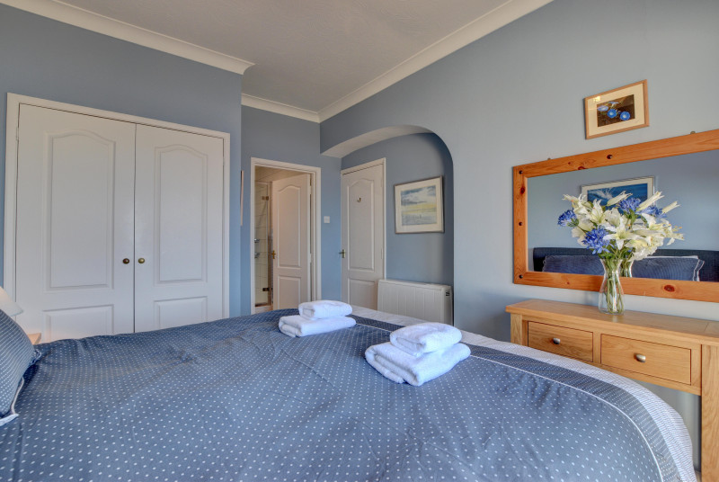 The master bedroom with ensuite bathroom