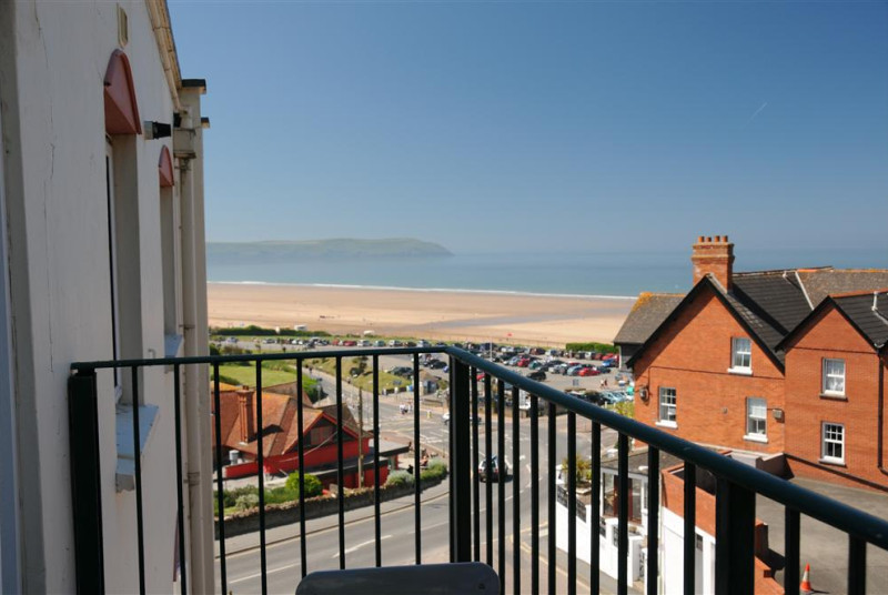 A stylishly furnished apartment with private parking in a great location with a short walk to this blue flag beach