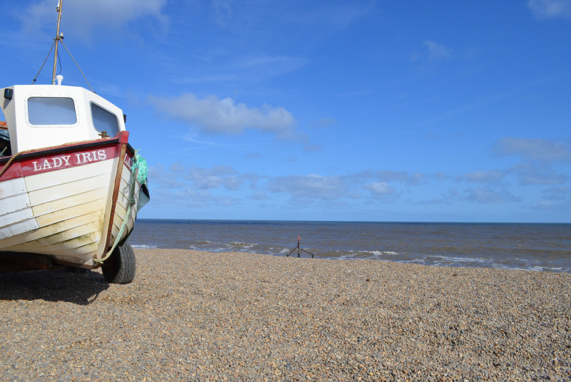 The shingle beach and coastal path are just a short stroll from the property