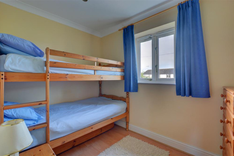 Bedroom three has full sized bunk beds