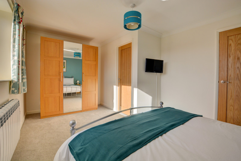 Bedroom 1 showing storage 