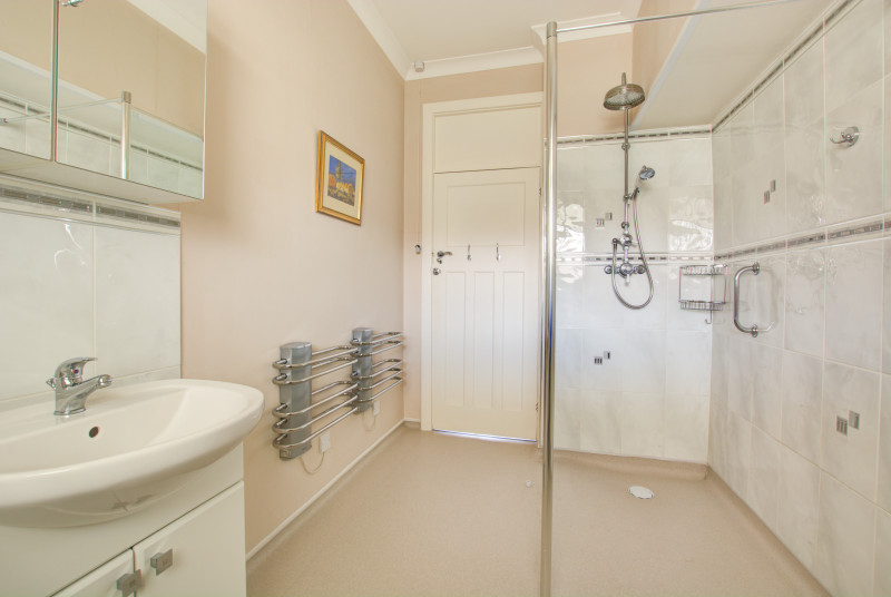 Wet Room with shower cubicle, wash basin and wc