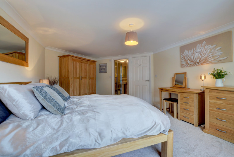 The spacious master bedroom with ensuite bathroom