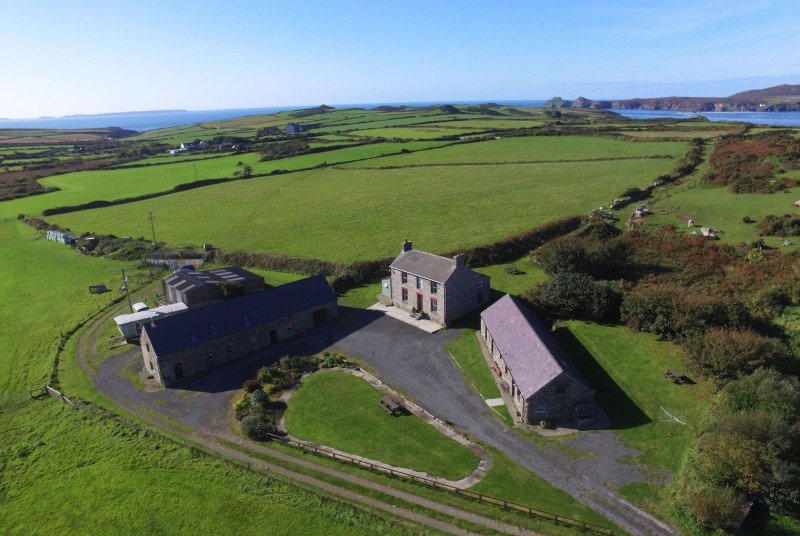 Aerial view of the cottages and coastline 